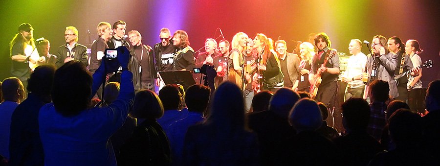 MonaLisa Twins on stage, taking part in a jam session with other artists at Tampere Beatles Happening 2015 at Tampere Hall in Finland