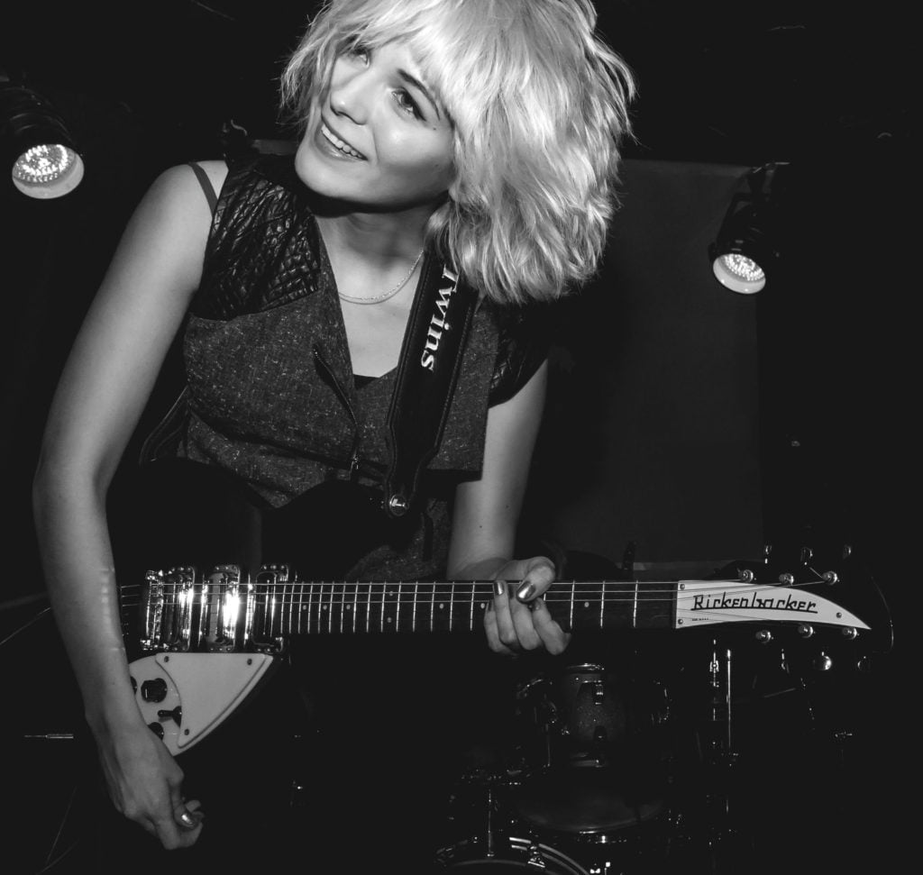 B/W photo of Mona playing at the Half Moon in Putney, London
